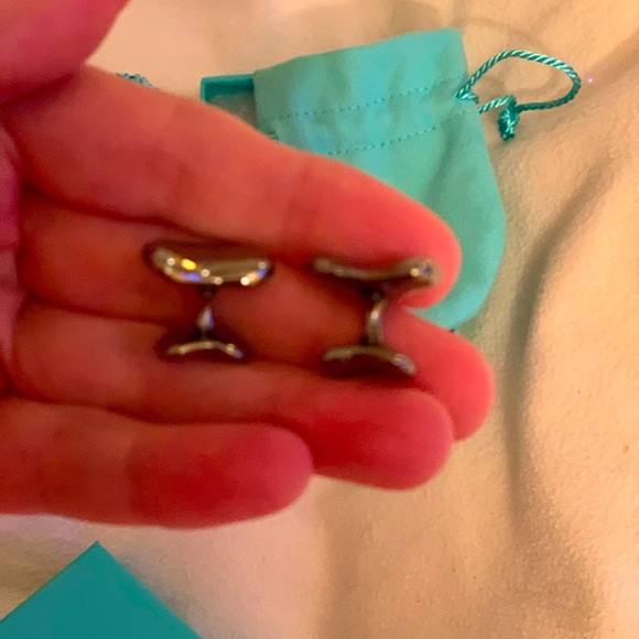 Authentic brand new Tiffany cufflinks with pouch.Must have for collectors !